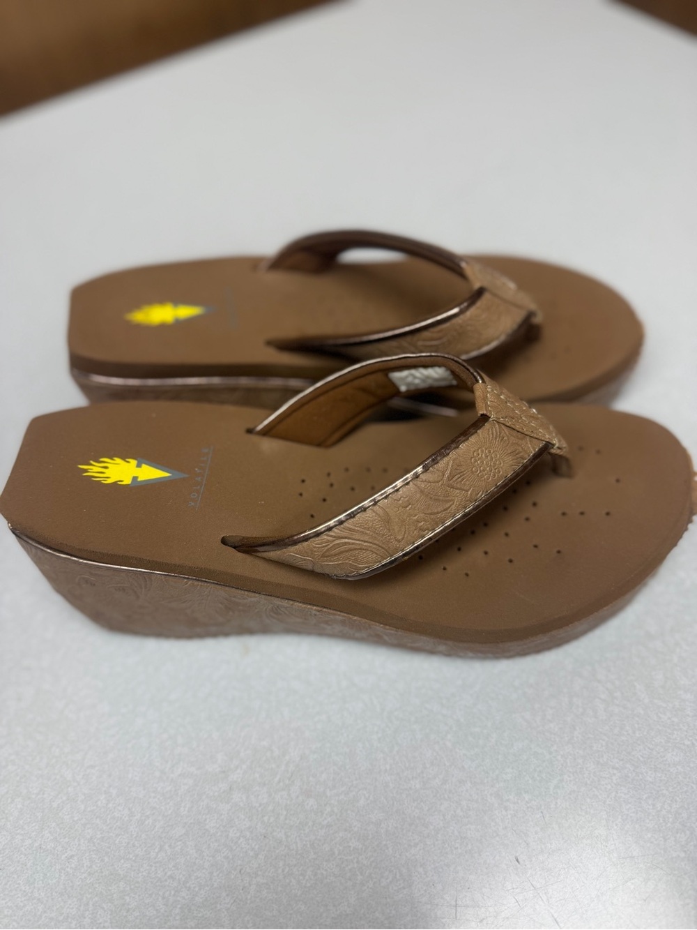 Volatile Women’s Wedge Flip Flop Sandals - Brown Tooled Leather
